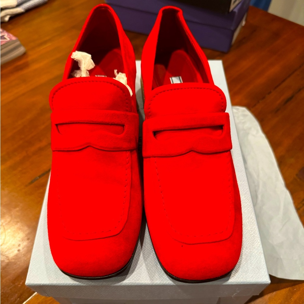 BNIB Prada Red Suede Loafers with ruby red rhinestone accents!